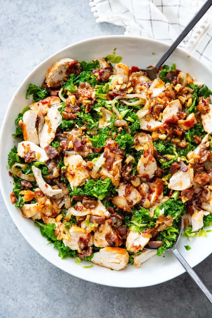 Kale Salad with Chicken, Caramelized Onions, and Hot Bacon Dressing {Paleo}