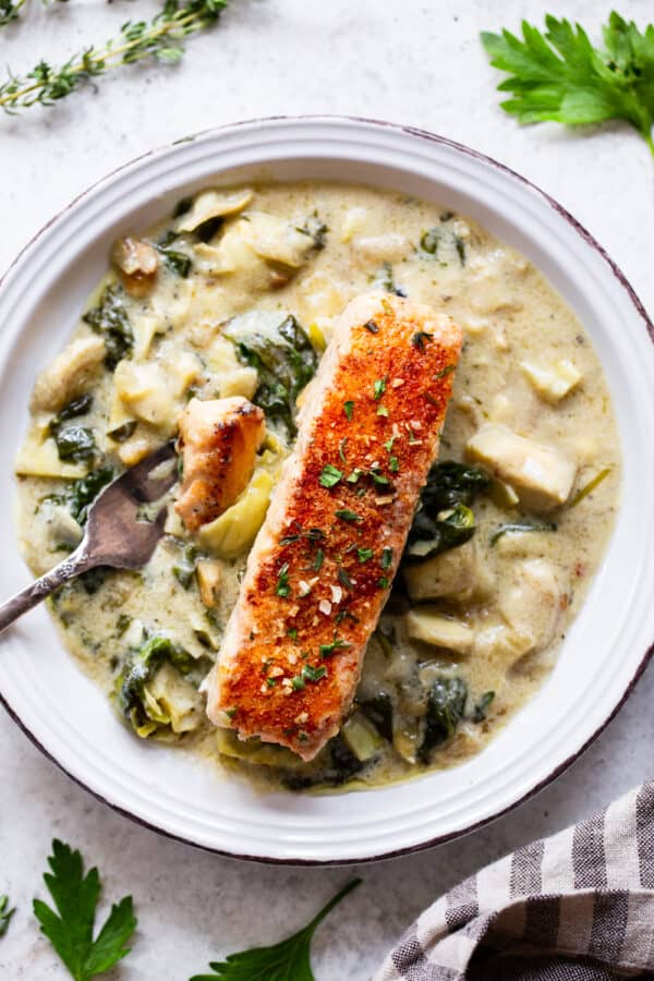 One Skillet Salmon with Creamy Spinach Artichoke Sauce {Whole30, Keto}