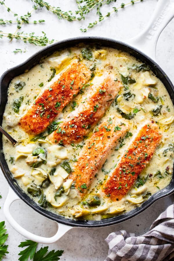 One Skillet Salmon with Creamy Spinach Artichoke Sauce {Whole30, Keto}