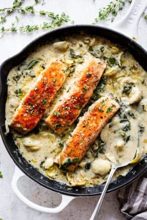 One Skillet Salmon with Creamy Spinach Artichoke Sauce {Whole30, Keto}