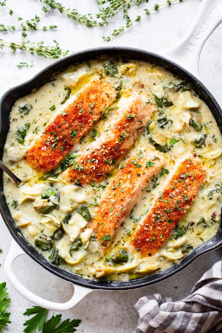 One Skillet Salmon with Creamy Spinach Artichoke Sauce {Whole30, Keto}